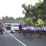 For some reason, school children marched in the roads blocking traffic.