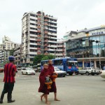 Lots of monks walking around in the middle of the city