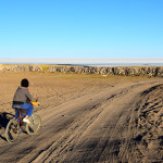 Uyuni Salt Flats Volcano Kid on Bike