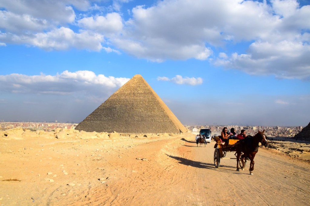 Visit the pyramids by horse, camel, cart, car, or bus. 