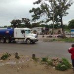 Bus from Harare to Lusaka Stop Truck