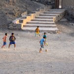 Kids playing some sunset soccer
