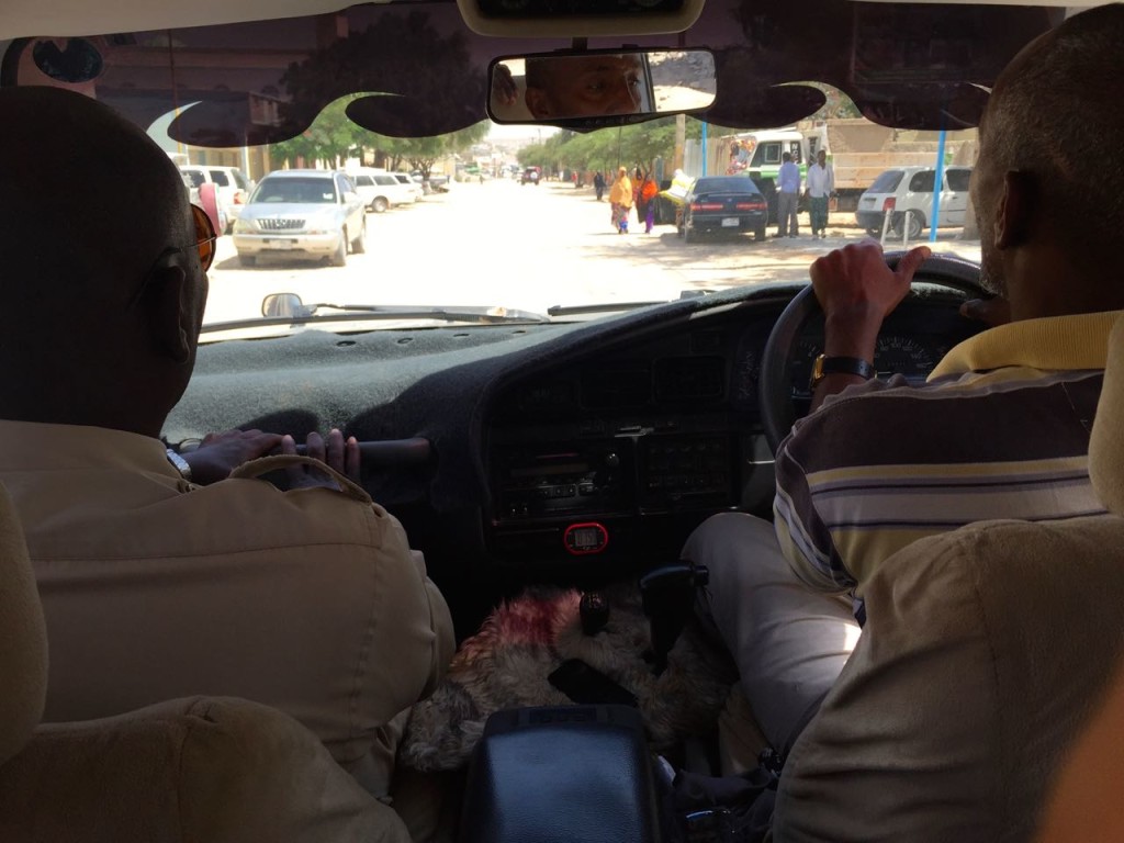 Driving through Hargeisa with our security detail. 