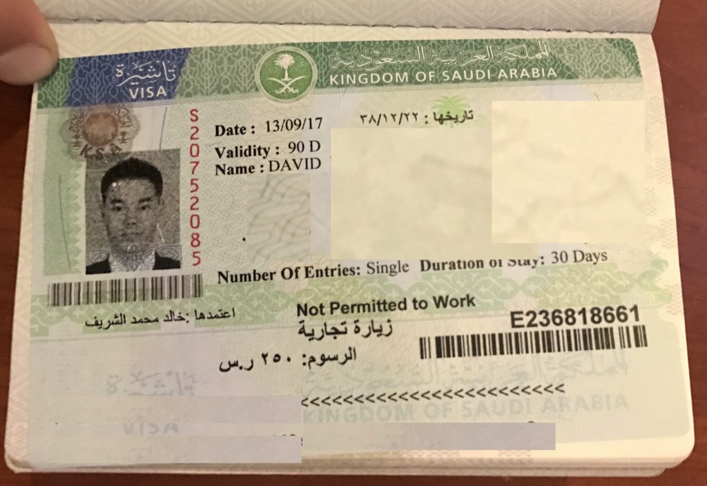 Happy with my visa in hand. Note: Poorly photoshopped the info out.